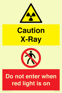 Caution X-Ray. Do not enter when red light is on